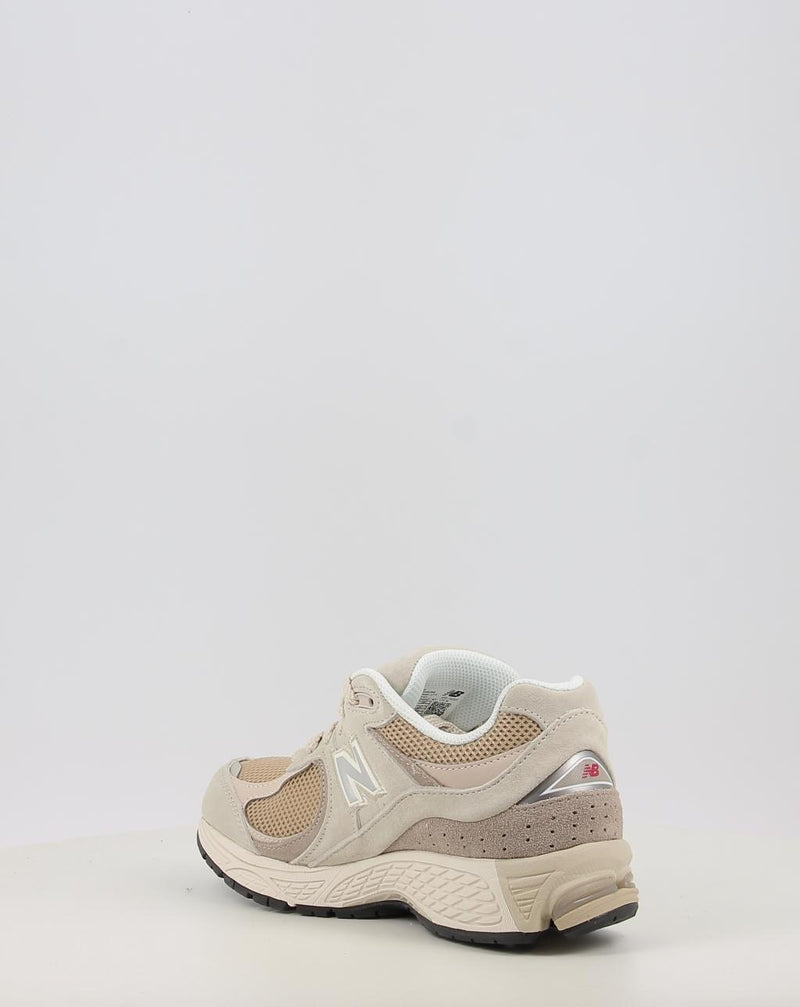 Sneakers NEW BALANCE U2002RB beige